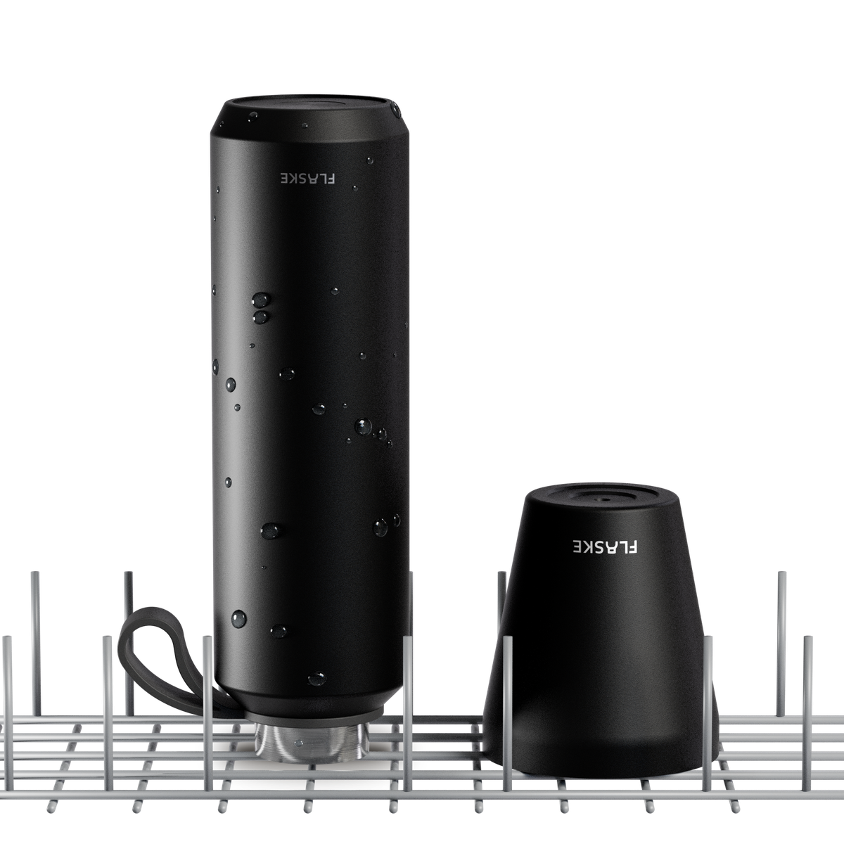 FLASKE EVO bottle and coffee cup upside down in a dishwasher basket, lids off